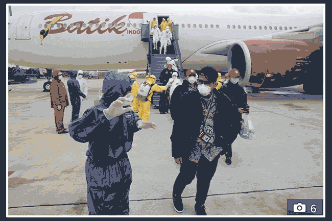 Immagini di passeggeri arrivati in Indonesia da Wuhan